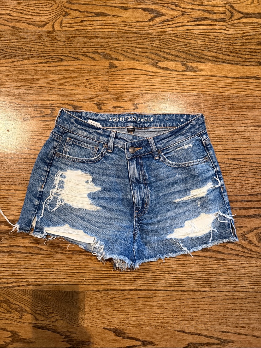American Eagle Outfitters Blue Distressed High-Rise cross-over Jean Shorts